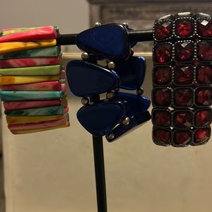 Three bracelets , navy blue and silver, ruby red and silver , multi color